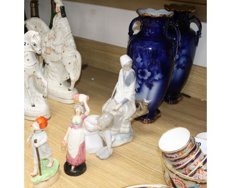 Two Lladro figures, a Royal Worcester figure Thursday's Child, Flo blue vases and other items