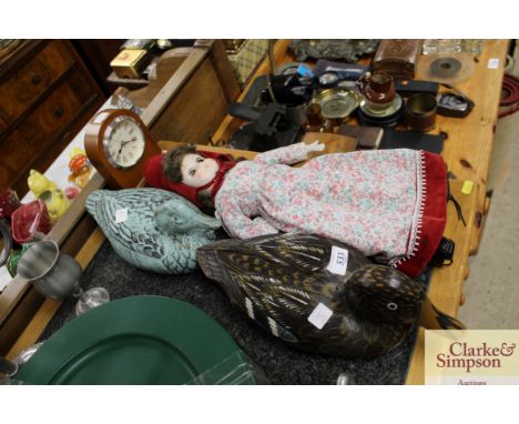 A wooden decoy duck type ornament; a pottery similar; a dressed doll and a London Clock Co. quartz mantel clock