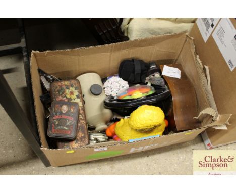 A box of miscellaneous items to include a mahogany cased mantel clock; various old tins; stoneware hot water bottle; cutlery 