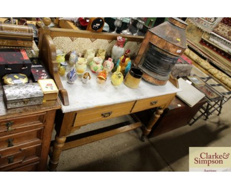 An Edwardian marble topped and tile back washstand 