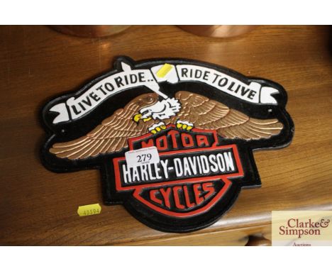 A cast iron replica Harley Davidson sign