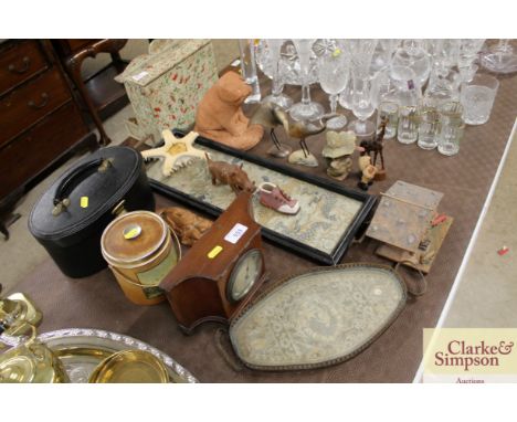 An embroidered two handled tray; a smaller similar; a 1930's mantel clock; and various other ornaments