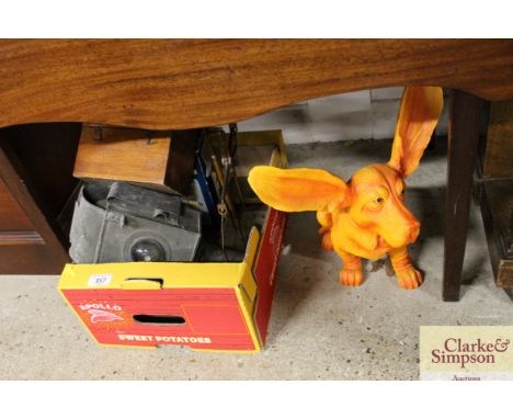 An antique copper lamp; a set of scales (incomplete) a spot hammered pewter bowl and cover; a mahogany box; and an orange dog