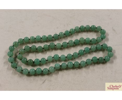 A string of jade coloured beads