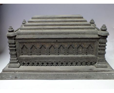AN INDIAN JEWELLERY CASKET WITH PROFUSE BRASS INLAY S/D, of architectural form, the hinged lid opening to reveal a reticulate