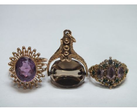 AN ANTIQUE STYLE GEMSET YELLOW METAL RING, together with an amethyst and yellow metal dress ring - marks indistinct, and a ye