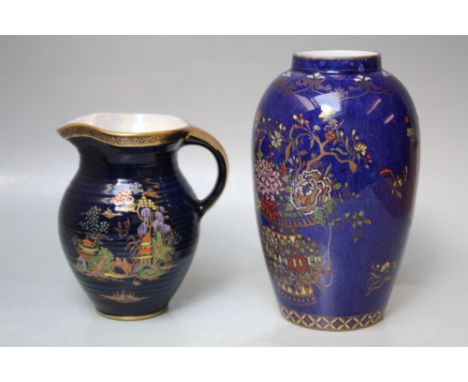 A VINTAGE CROWN DEVON CREAM JUG, blue ground with gilded decoration of  an Oriental garden, H 14 cm, together with a decorati