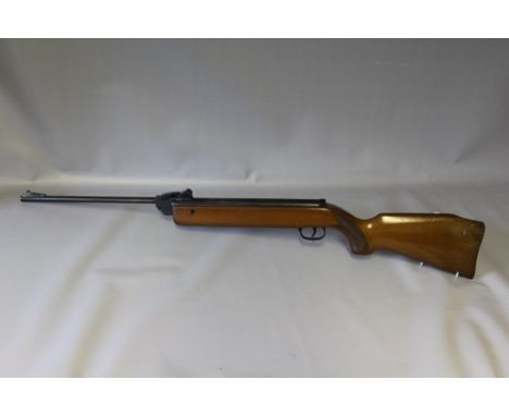 A DIANA G79 .22 AIR RIFLE WITH CASE, the barrel having adjustable sight, overall L 106 cmCondition Report:Wear and lacquer lo