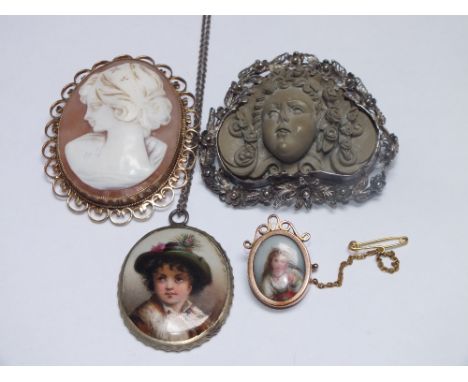 A 9CT GOLD OVAL CAMEO BROOCH WITH PIERCED BORDER, H 5.5 cm, together with a Victorian lava cameo brooch, a small oval portrai