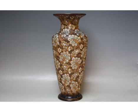 A TALL DOULTON LAMBETH SLATERS PATENT DECORATIVE STONEWARE VASE, of baluster form with flared rim, enamel floral and textured