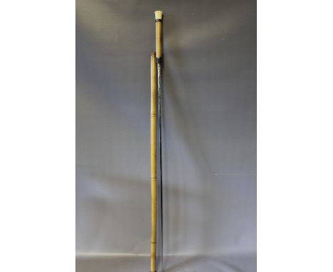 A BAMBOO SWORD STICK,  stamped Coulax to the blade, ivory knop, L 96 cm