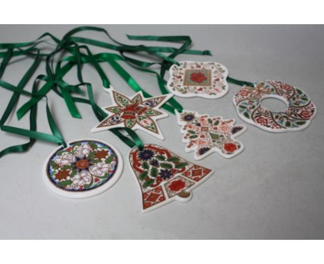 A COLLECTION OF SIX ROYAL CROWN DERBY CERAMIC CHRISTMAS ORNAMENTS, to include Christmas Tree, Star, Bell and Wreath examples,