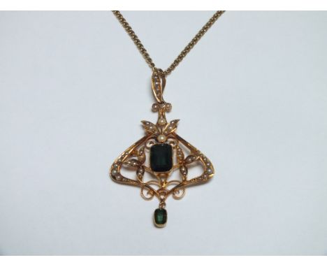 A 15CT GOLD PENDANT ON CHAIN, set with emerald cut green stones and seed pearls, approx weight  8.4g