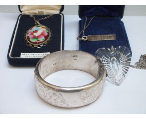 A HALLMARKED SILVER HINGED BANGLE. together with a hallmarked 'Toblerone' pendant, a Stratton silver and cloisonne enamel pen