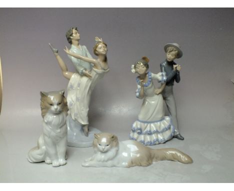 A NAO DANCERS FIGURINE 'FLAMENCO DANCERS', together with a Nao ballet dancers group figure and two cat figures (4)