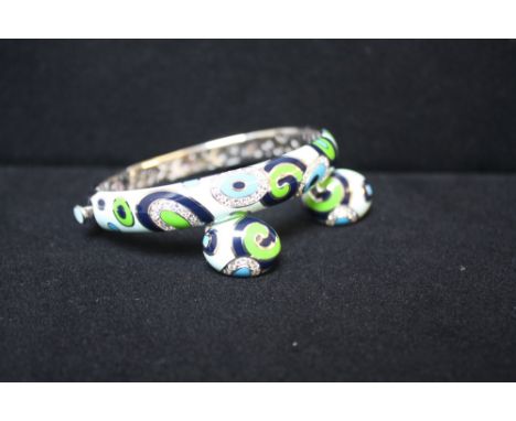 A ROBERTO COIN 18CT WHITE GOLD AND DIAMOND ENAMELLED BANGLE AND PAIR OF EAR-CLIPS FROM THE 'VINTAGE' COLLECTION, the bangle w