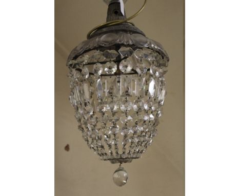 A GLASS CRYSTAL LUSTRE CEILING LIGHT WITH MOUNTING ROSE. having various cut glass droppers forming a closed basket, with lowe