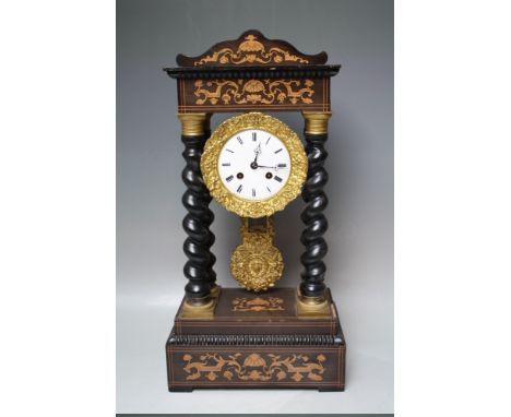 A LATE 19TH CENTURY FRENCH ROSEWOOD AND INLAID PORTICO CLOCK, the circular cased movement with enamel dial and Roman numerals