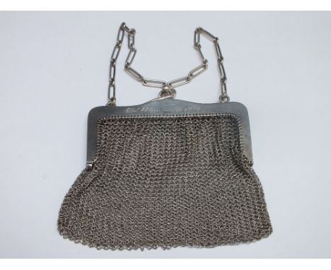 A LADIES SILVER AND MESH LINK PURSE, the frame stamped .925 with makers mark for H &amp; Co., carry chain stamped .925 to ind