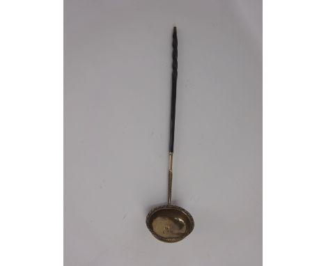 Georgian toddy ladle, London hall marked silver bowl with twisted baleen  handle, engraved with initials GRM, L35cm. Provenan