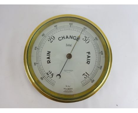 Brass bulkhead Sestrel Compensated aneroid Marine barometer 'IN Hg' millibars, on wooden plaque, D23cm   Condition Report   C
