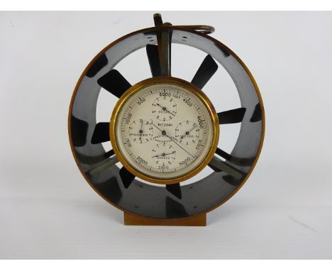 Brass & japanned Anemometer, silvered dial inscribed T A Armstrong & Bro. Manchester No. 2091, with four subsidiary dials, H1