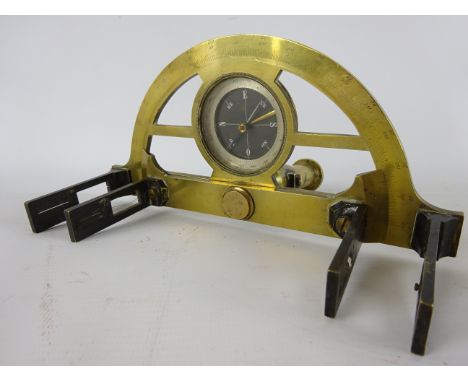 Late 19th century brass Graphometer, probably French, potractor engraved 0° - 180, the inset compass with silvered scale, on 