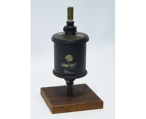 20th century Ordnance Timing Device, No. 39305N, on wooden plinth, H33cm   Condition Report   Click here for further images, 