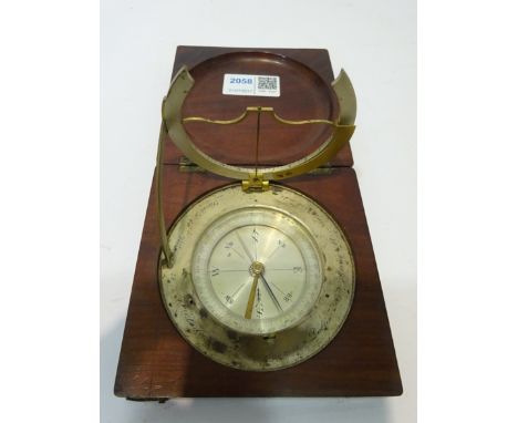 A 19th century equinoctial compass sundial, the circular silvered dial engraved with seven World cities, with inset compass w