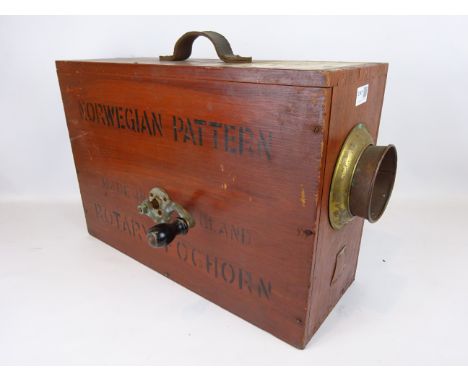 A Norwegian patent Rotary fog horn, made in England, instruction label to top, the serpentine crank with turned wooden handle