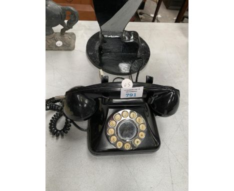 A VINTAGE BLACK TELEPHONE 