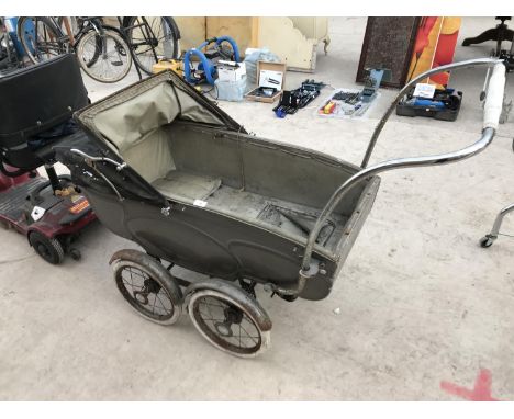 A VINTAGE SILVER CROSS PRAM 