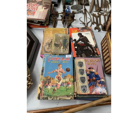 A COLLECTION OF VINTAGE BOOKS TOGETHER WITH SOME JAGUAR STICKERS 