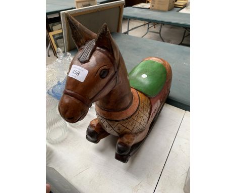 A SMALL WOODEN VINTAGE ROCKING HORSE 