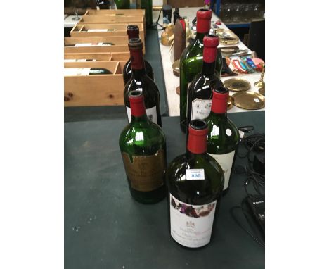 SEVEN VINTAGE WINE BOTTLES (EMPTY) 