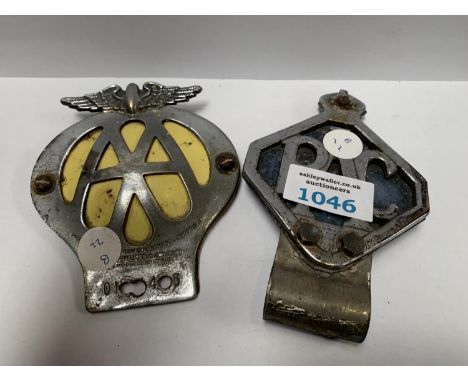 TWO VINTAGE CAR BADGES 