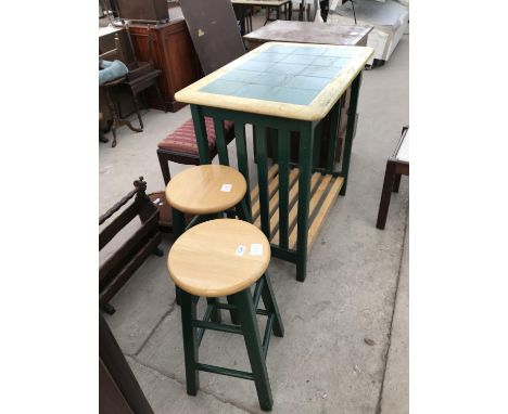 A GREEN AND BEECH TILE TOP KITCHEN TABLE AND TWO STOOLS 
