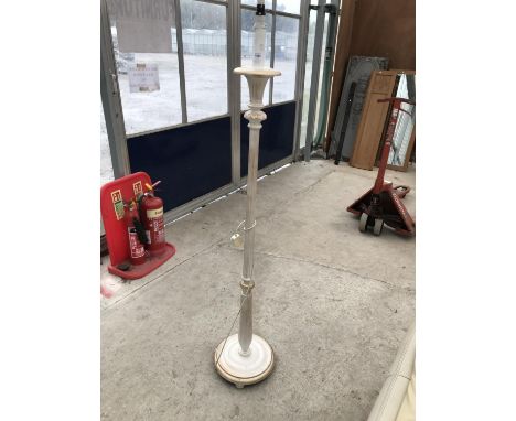 A GILDED STANDARD LAMP 