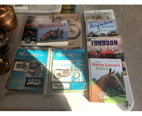 A SET OF MOTOR CYCLE BOOKS, TRACTOR BOOKLETS ETC 
