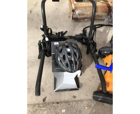 A CAR CYCLE RACK AND HELMET 