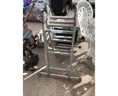 A FOUR SECTION FOLDING ALLOY LADDER 