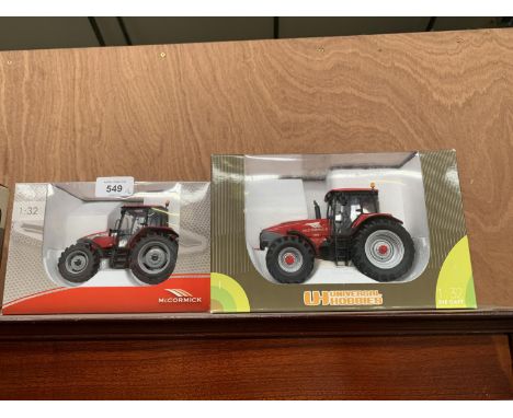 A UNIVERSAL HOBBIES MODELS - MC CORMICK TRACTORS MC-130 AND A ZTX BOTH 1-32 SCALE BOXED AND IN MINT CONDITION 