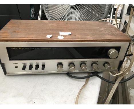 A VINTAGE ROTEL SOLID STATE AM/FM STEREO RECEIVER 