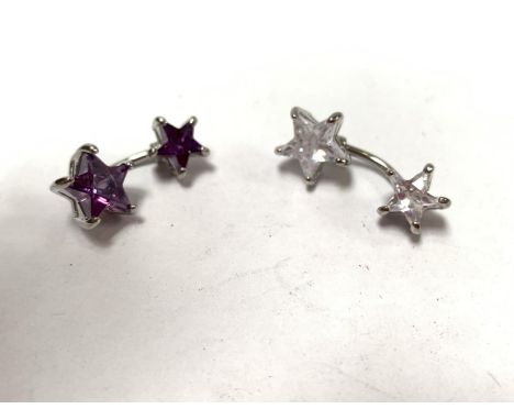 TWO BELLY BUTTON RINGS 
