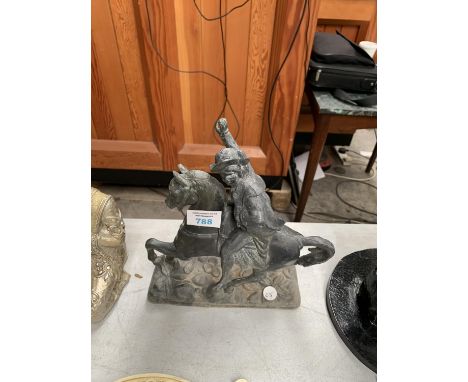 A VINTAGE METAL HORSE AND RIDER 