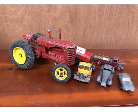 A MASSEY HARRIS TRACTOR DIE CAST MODEL AND FOUR MODEL CARS 