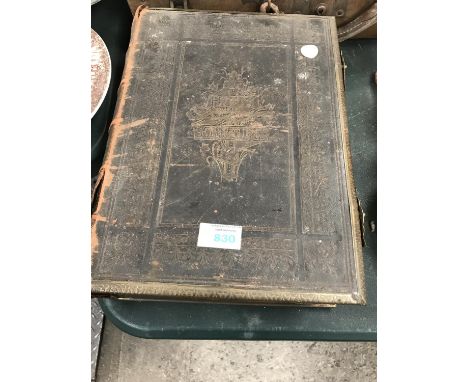 A VINTAGE BIBLE WITH METAL CLASPS 