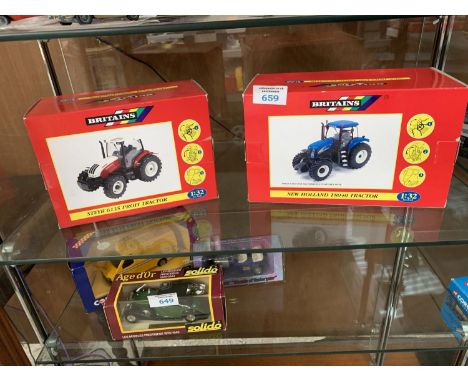 TWO BRITAINS BOXED TRACTOR MODELS TO INCLUDE NEW HOLLAND T8040 TRACTOR AND STEYR 6135 PROFI TRACTOR 