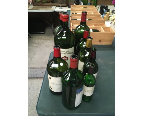 NINE VINTAGE WINE BOTTLES (EMPTY) 