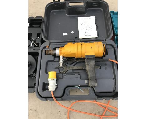 A WEKA 110 VOLT DIAMOND CORE DRILL - MODEL DK1603 WITH CASE AND INSTRUCTION MANUAL - SOLD IN WORKING ORDER 